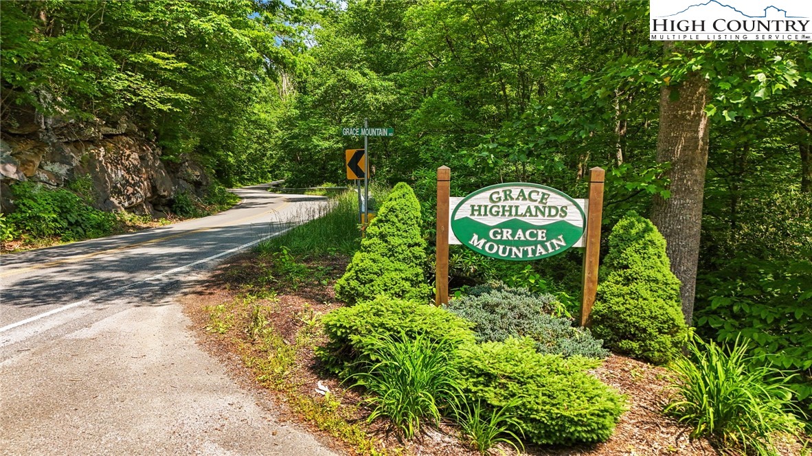 T-1 Grace Mountain Road Todd, NC 28684 - Photo 28 of 28 a sign that is sitting in front of a tree