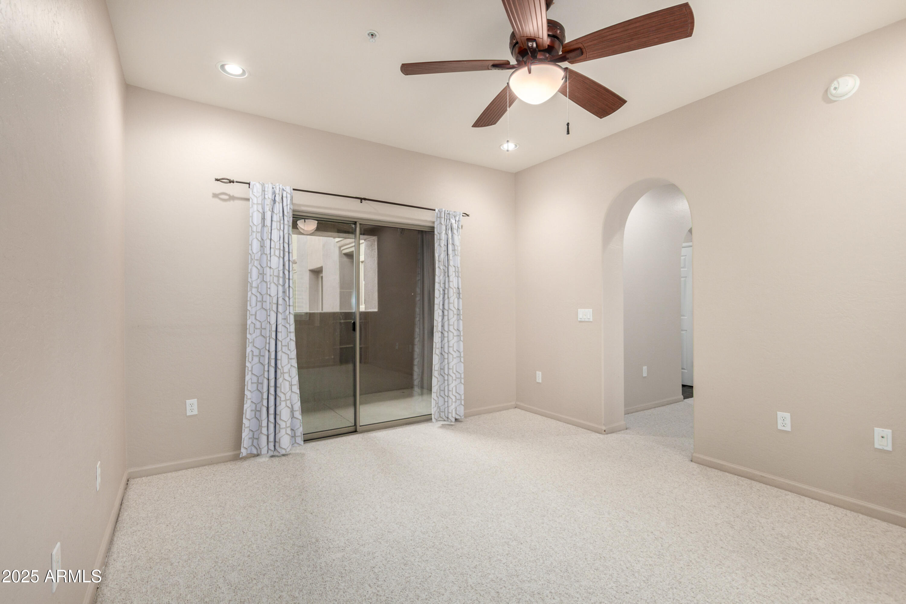 3935 East Rough Rider Road, Unit 1190 Phoenix, AZ 85050 - Photo 12 of 34 Bonus room patio
