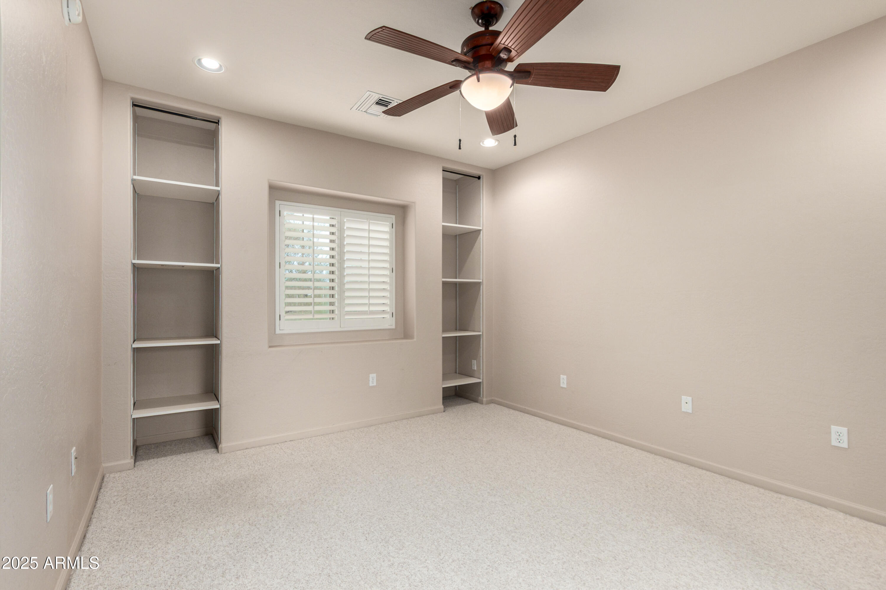 3935 East Rough Rider Road, Unit 1190 Phoenix, AZ 85050 - Photo 13 of 34 Bonus room office gym