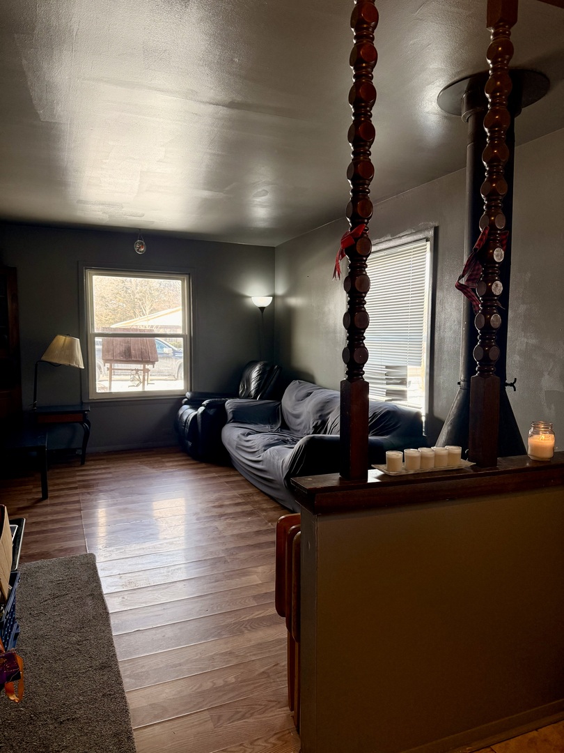 1341 Beverly Lane Streamwood, IL 60107 - Photo 7 of 14 a kitchen with kitchen island a counter top space appliances and a window
