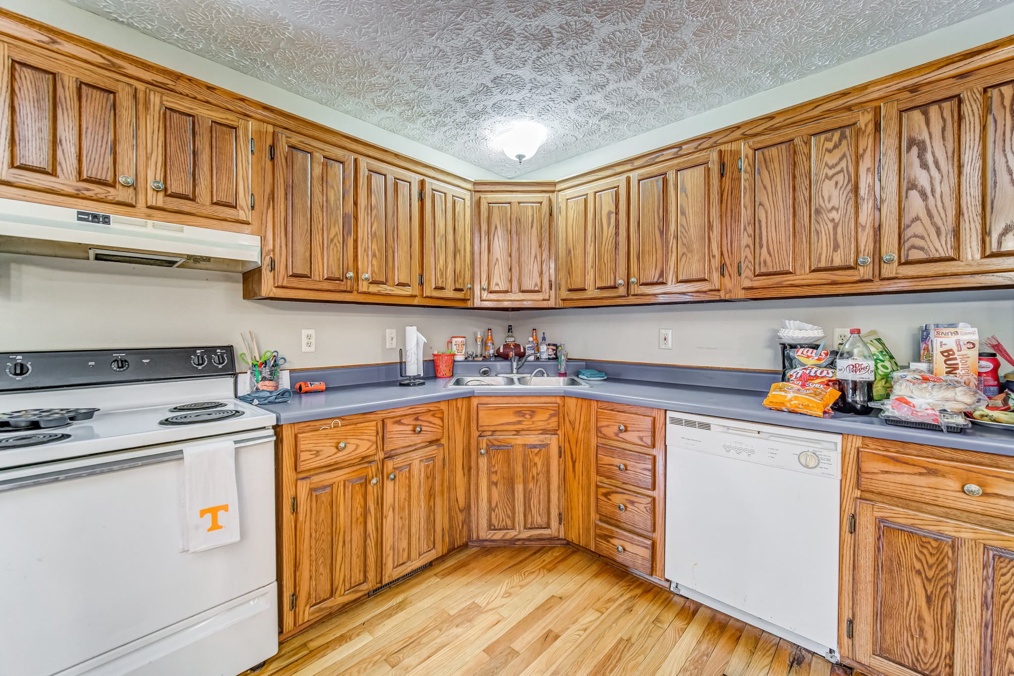 3545 Kelton Jackson Road Springfield, TN 37172 - Photo 20 of 47 a kitchen with stainless steel appliances granite countertop a refrigerator sink stove and cabinets