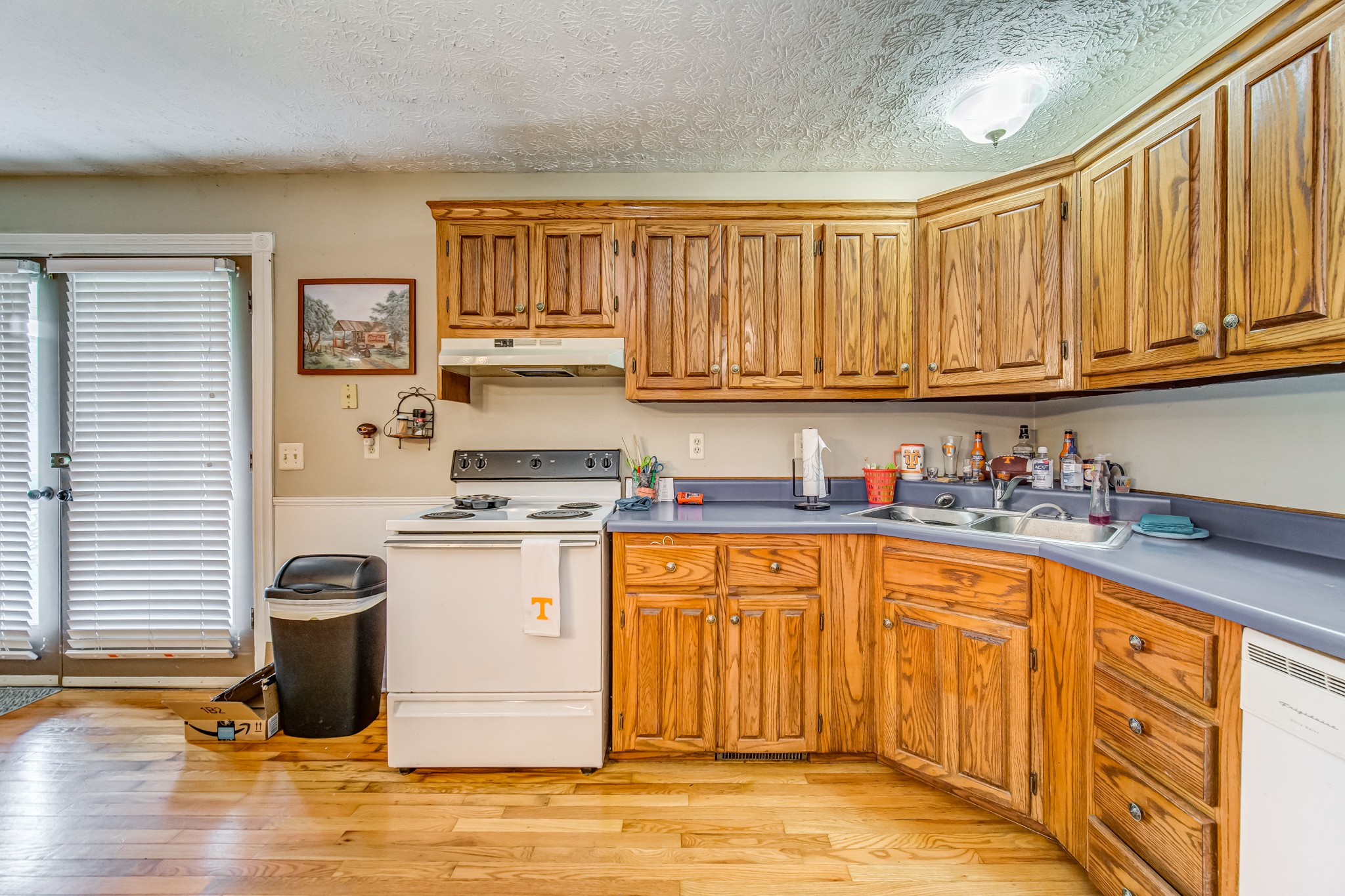3545 Kelton Jackson Road Springfield, TN 37172 - Photo 21 of 47 a kitchen with stainless steel appliances granite countertop a stove sink and cabinets