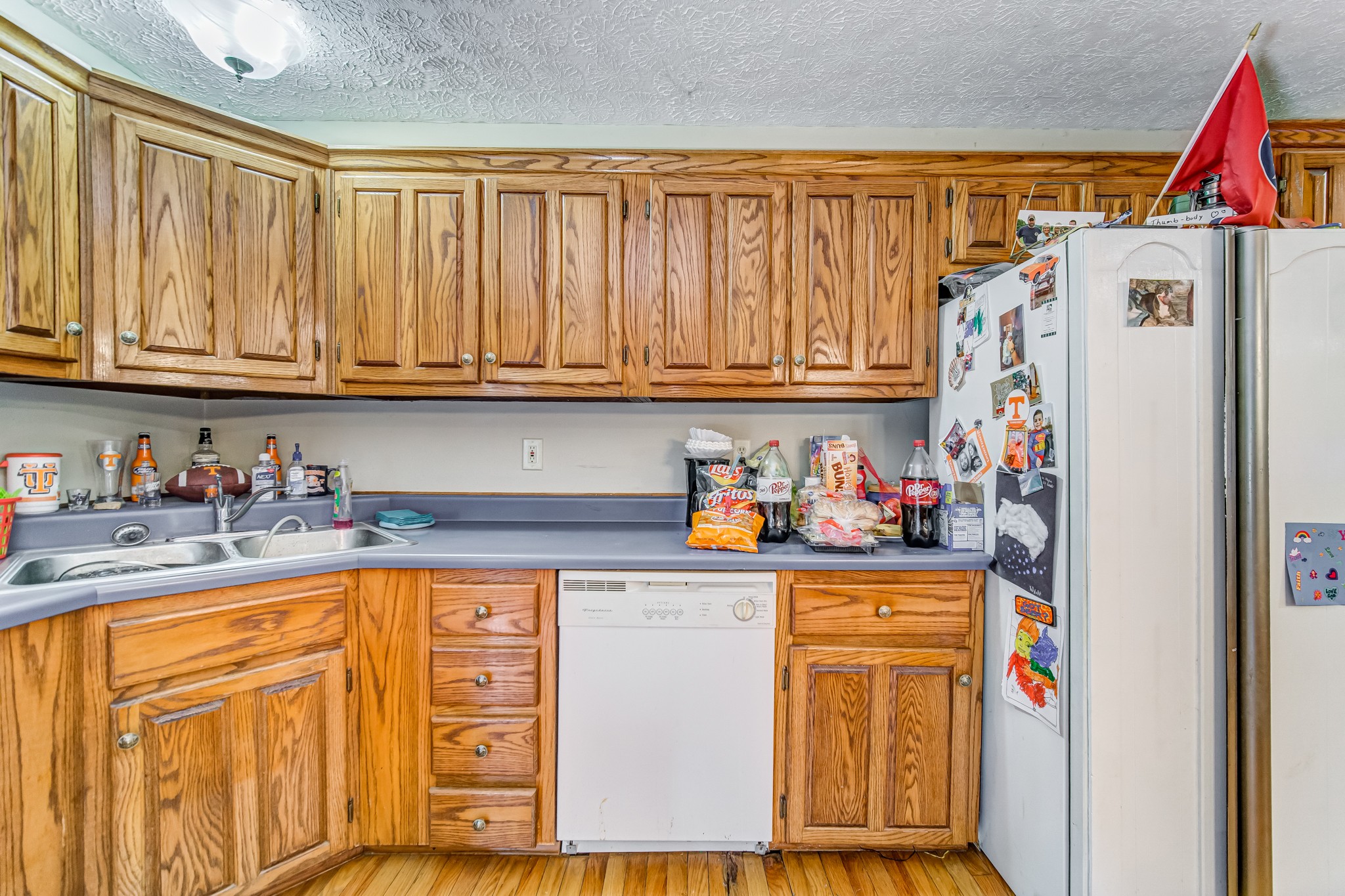 3545 Kelton Jackson Road Springfield, TN 37172 - Photo 22 of 47 a kitchen with stainless steel appliances granite countertop a refrigerator and a stove top oven