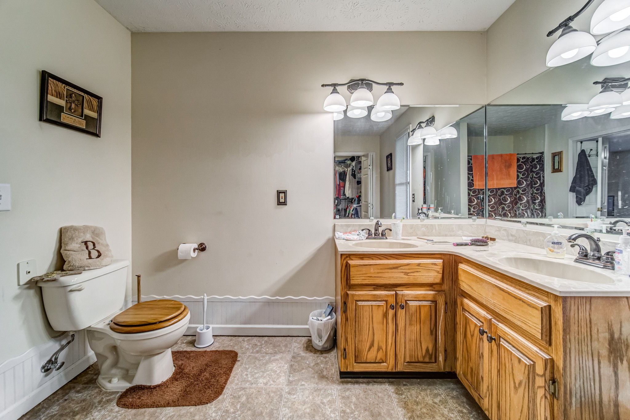 3545 Kelton Jackson Road Springfield, TN 37172 - Photo 27 of 47 a bathroom with a sink a toilet and a mirror