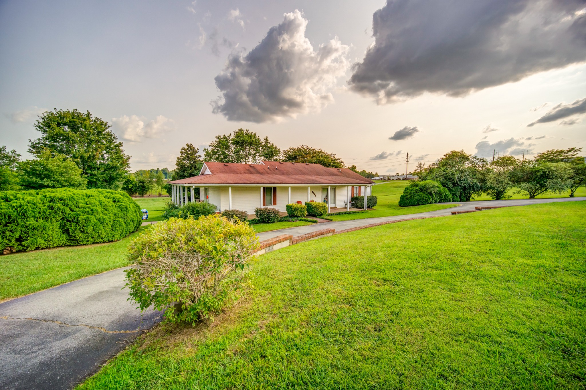 3545 Kelton Jackson Road Springfield, TN 37172 - Photo 3 of 47 a front view of a house with garden