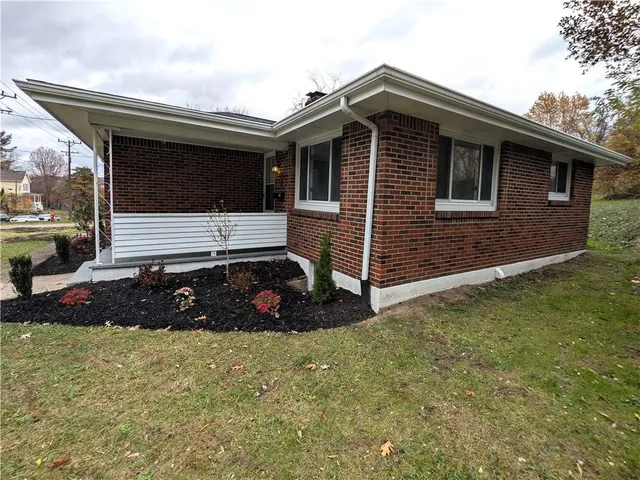 a front view of house with yard