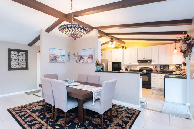 a bed room with bed and a window