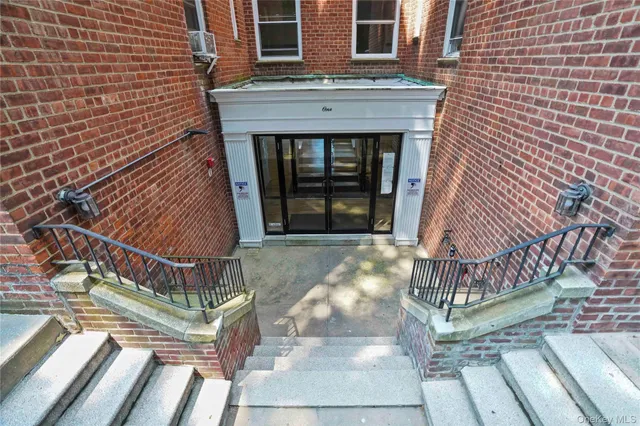 a front view of a house with garage