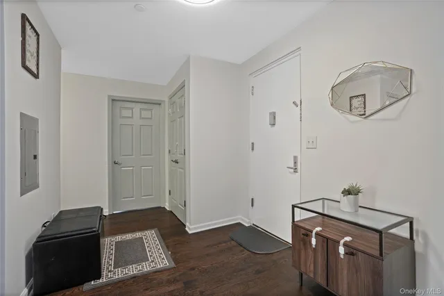 a view of a livingroom with furniture and wooden floor