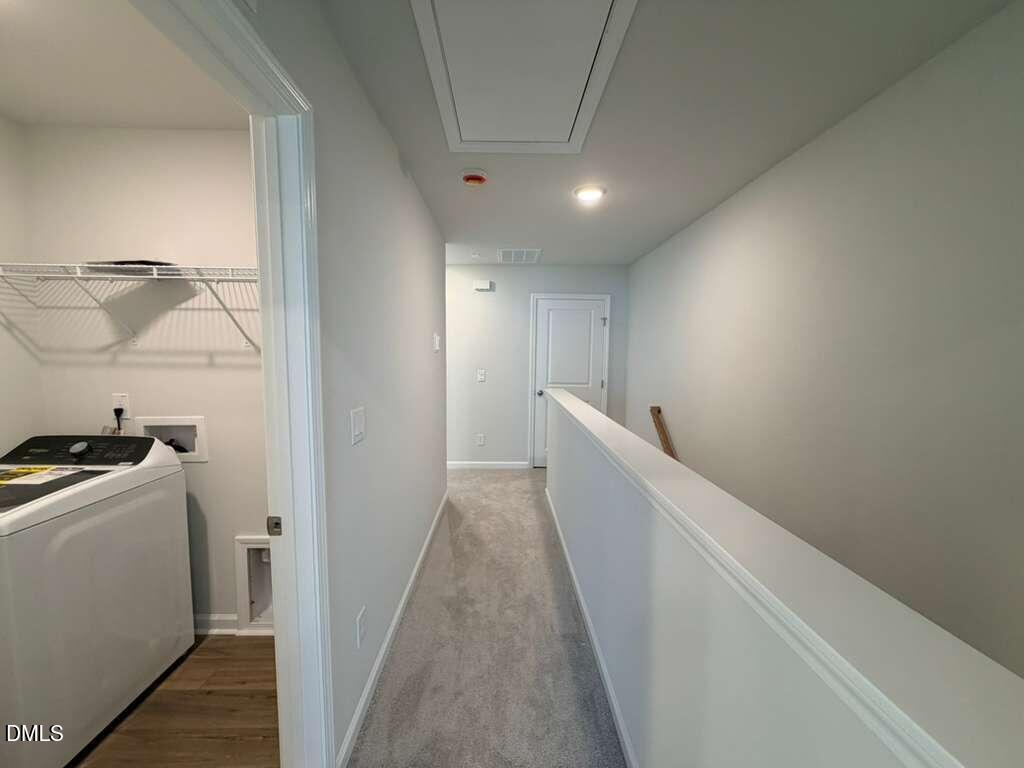 5024 Reader Way Durham, NC 27703 - Photo 14 of 26 a view of hallway with washer and dryer