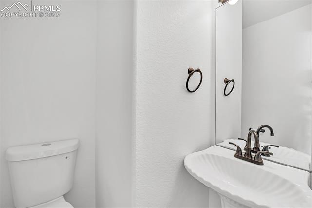 6560 Leesburg Road Colorado Springs, CO 80922 - Photo 13 of 42 Main Level Half Bath