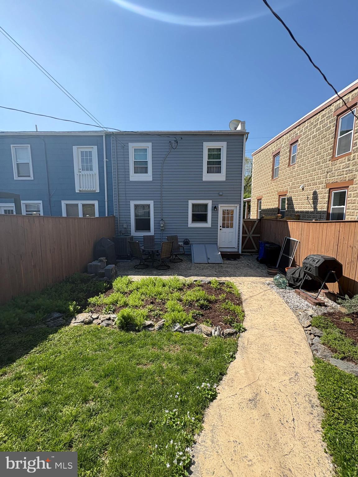 225 East 5th Street Frederick, MD 21701 - Photo 14 of 20 a front view of a house with a yard