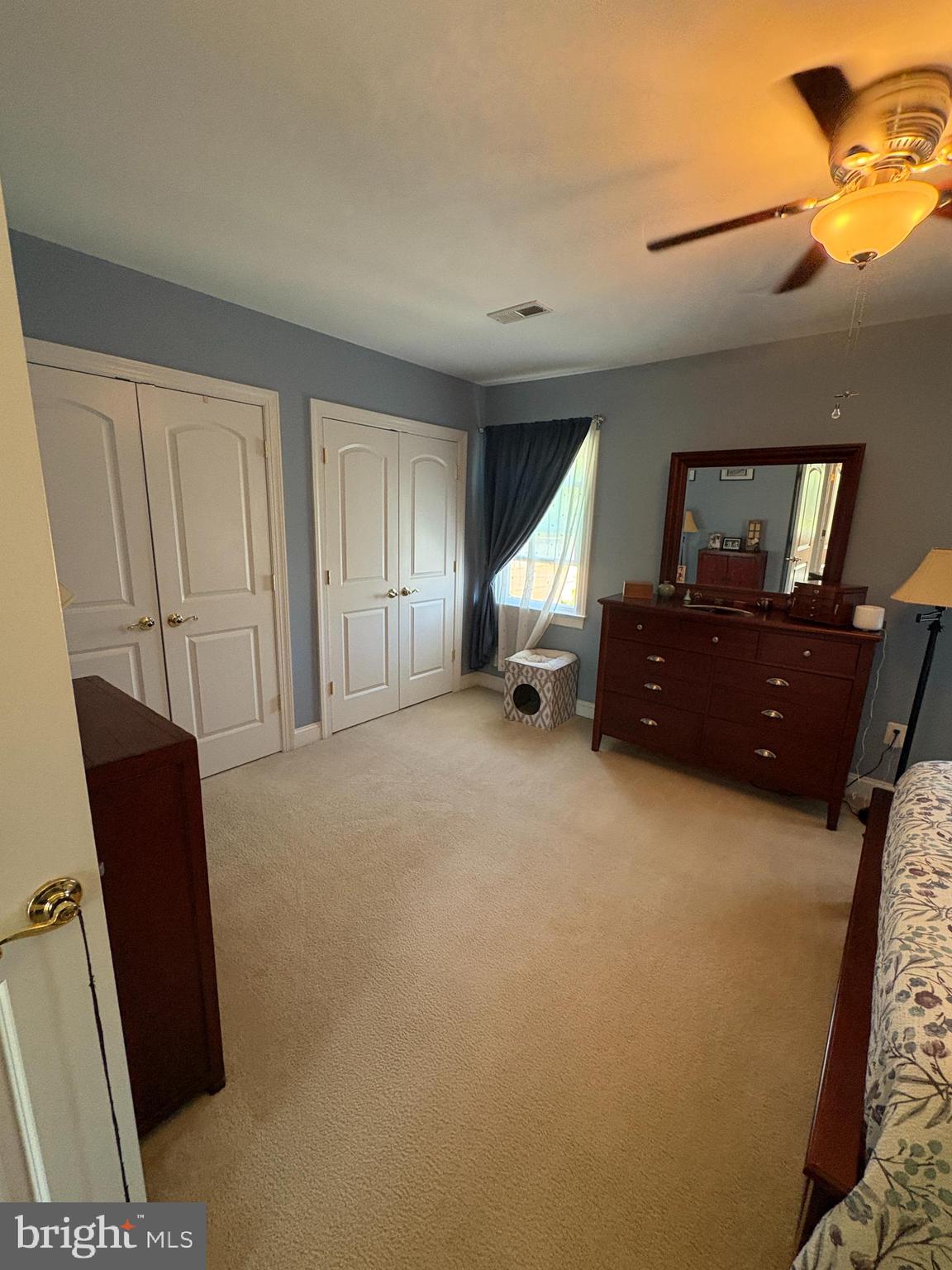 225 East 5th Street Frederick, MD 21701 - Photo 16 of 20 a living room with furniture and a flat screen tv