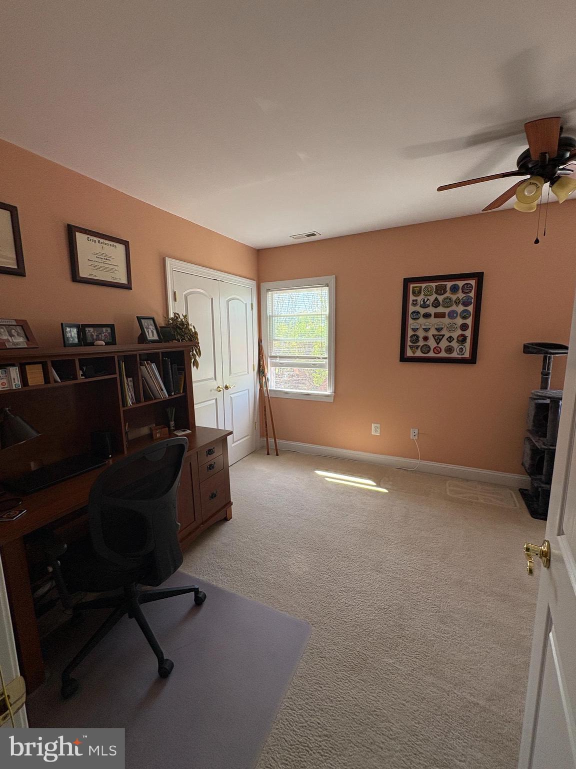 225 East 5th Street Frederick, MD 21701 - Photo 5 of 20 a living room with furniture and a flat screen tv
