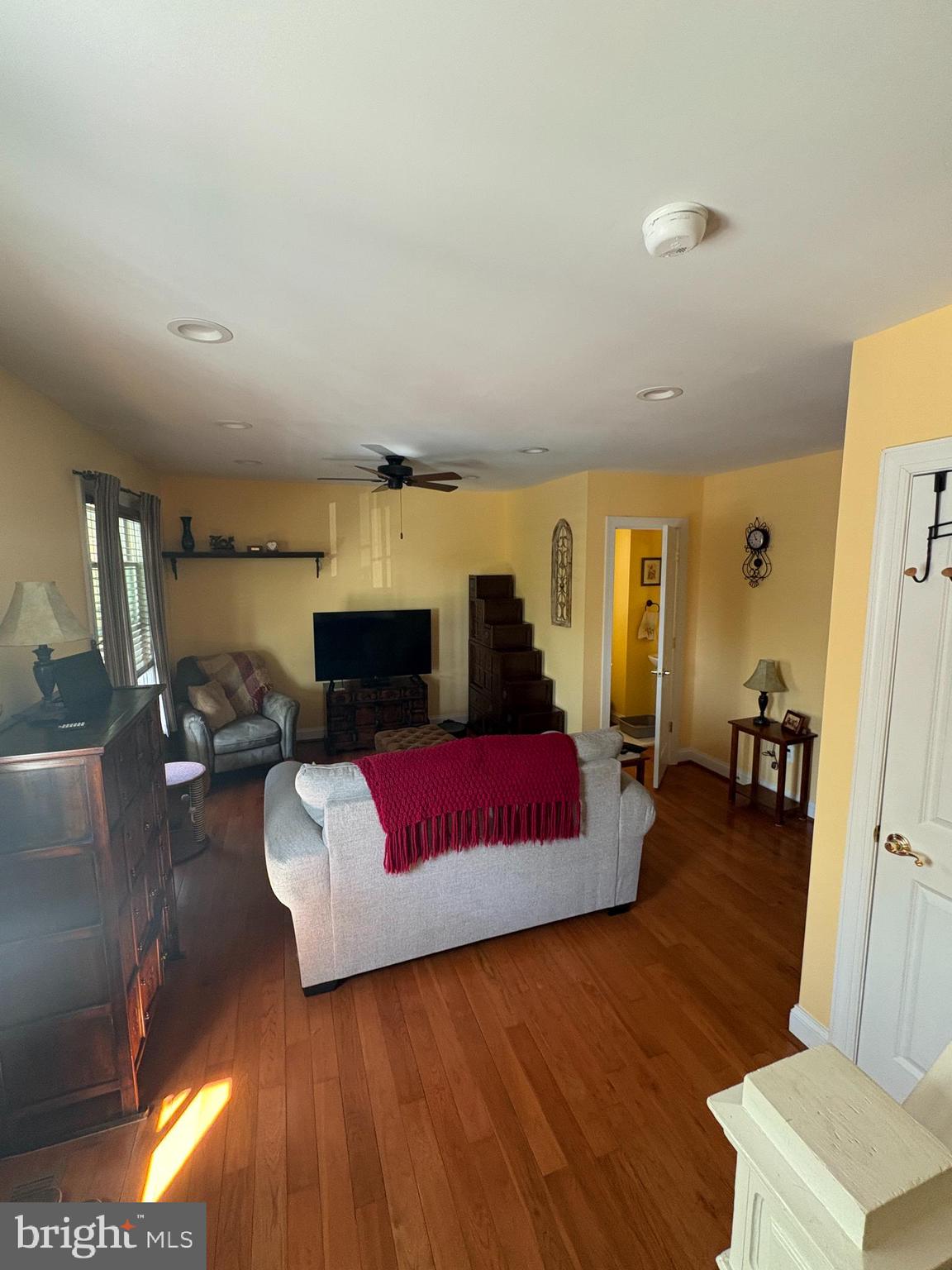 225 East 5th Street Frederick, MD 21701 - Photo 7 of 20 a living room with furniture and a wooden floor