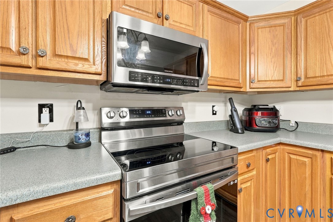 133 Ford Road Bumpass, VA 23024 - Photo 12 of 55 Kitchen featuring wood cabinetry, stainless steel