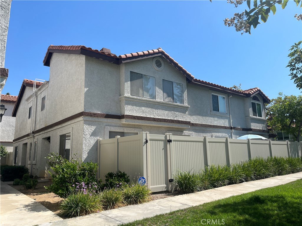 24202 Sylvan Glen Road, Unit D Diamond Bar, CA 91765 - Photo 1 of 1 a view of a house with yard and plants