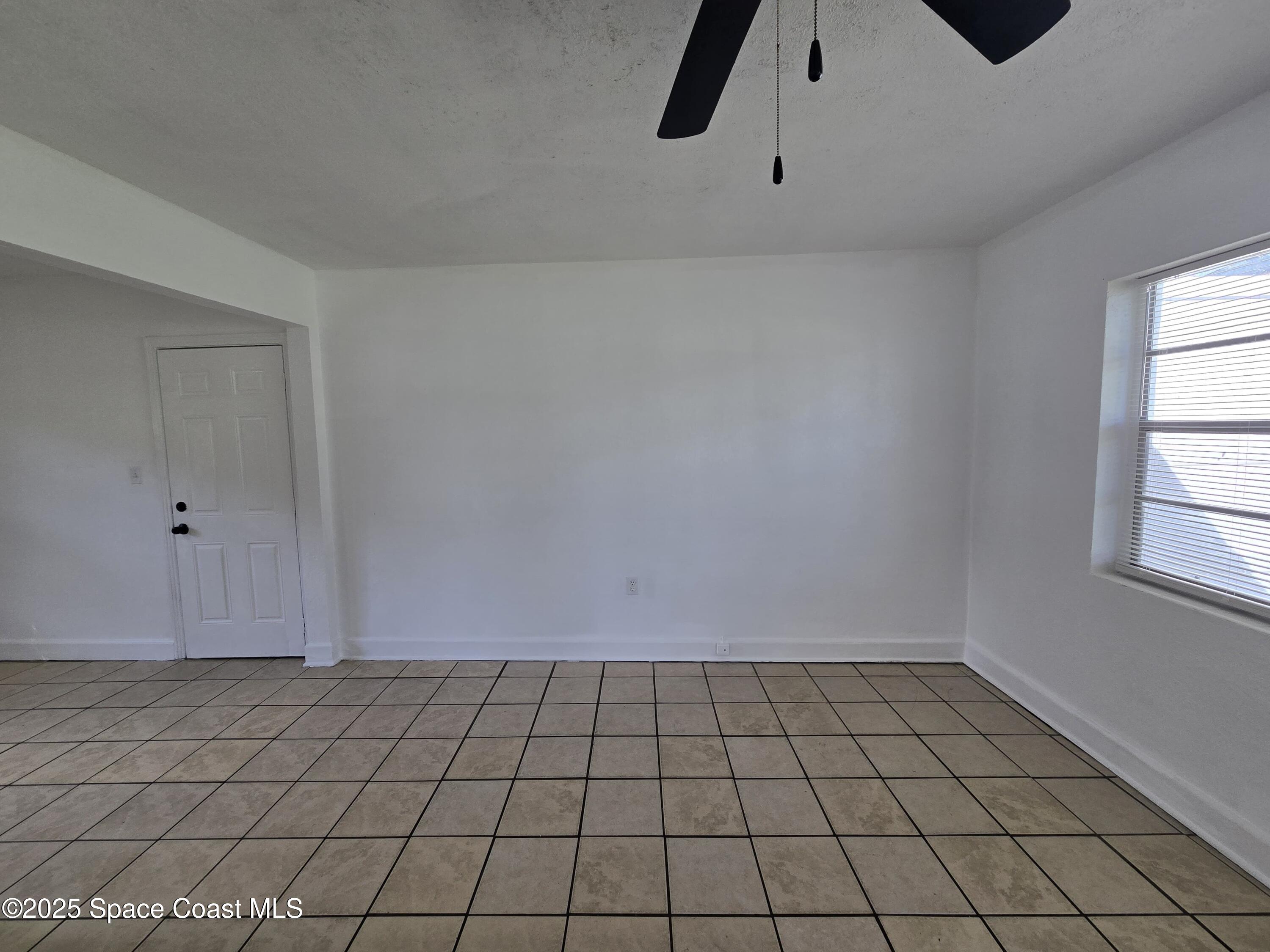513 North Georgia Avenue Cocoa, FL 32922 - Photo 7 of 20 a view of an empty room