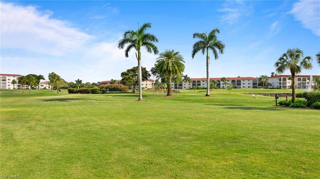 45 High Point Circle South, Unit 304 Naples, FL 34103 - Photo 20 of 20 a view of a park with palm trees