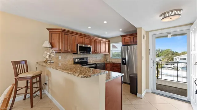 $300,000 | 45 High Point Circle South, Unit 304, Naples, FL 34103