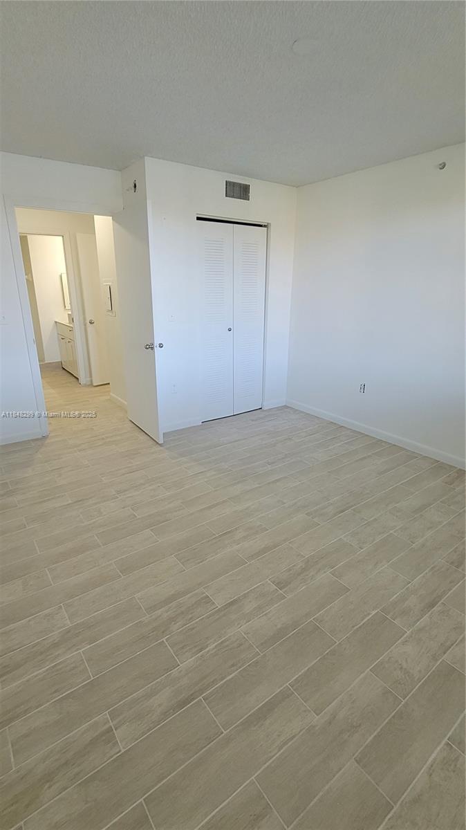 2021 Renaissance Boulevard, Unit 104 Miramar, FL 33025 - Photo 11 of 16 a view of an empty room