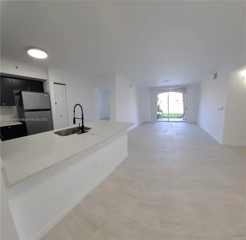 a bedroom with a bed and a mirror