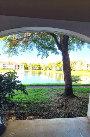 a view of a garden with an outdoor space