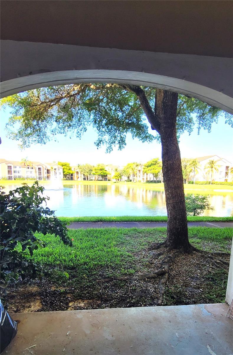 2021 Renaissance Boulevard, Unit 104 Miramar, FL 33025 - Photo 7 of 16 a view of a garden with an outdoor space