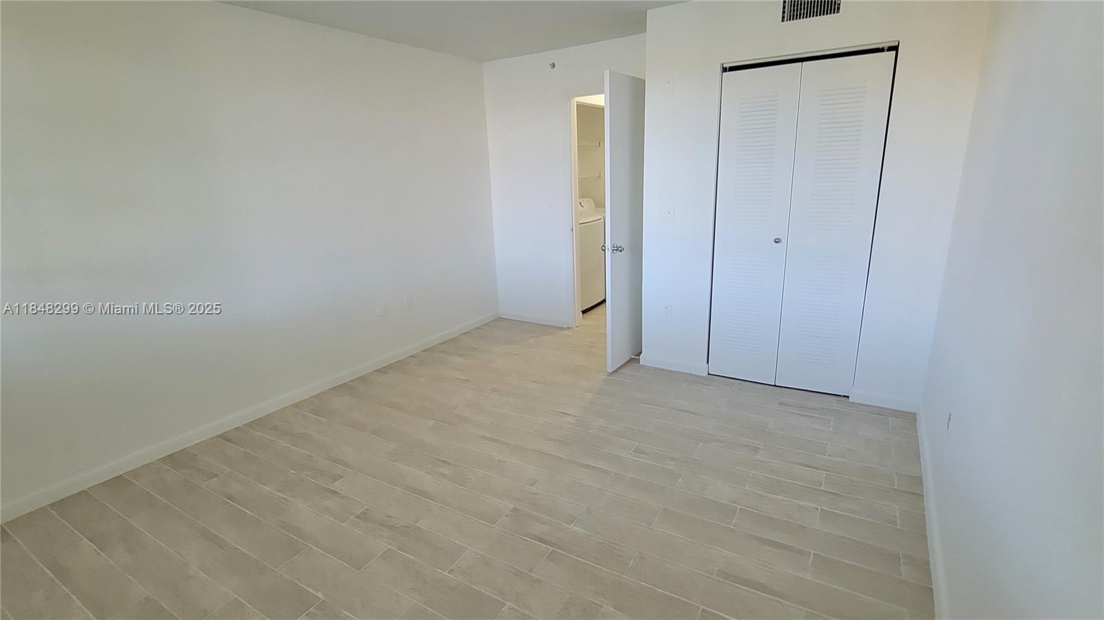 2021 Renaissance Boulevard, Unit 104 Miramar, FL 33025 - Photo 10 of 16 a view of an empty room
