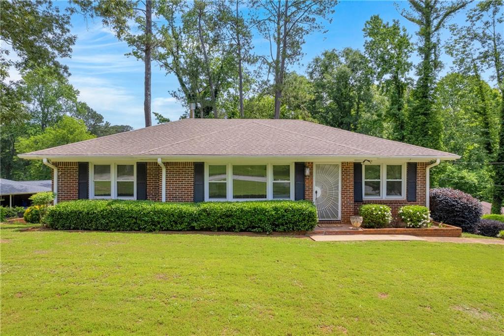 2320 Tilson Circle Decatur, GA 30032 - Photo 1 of 1 a front view of a house with a garden