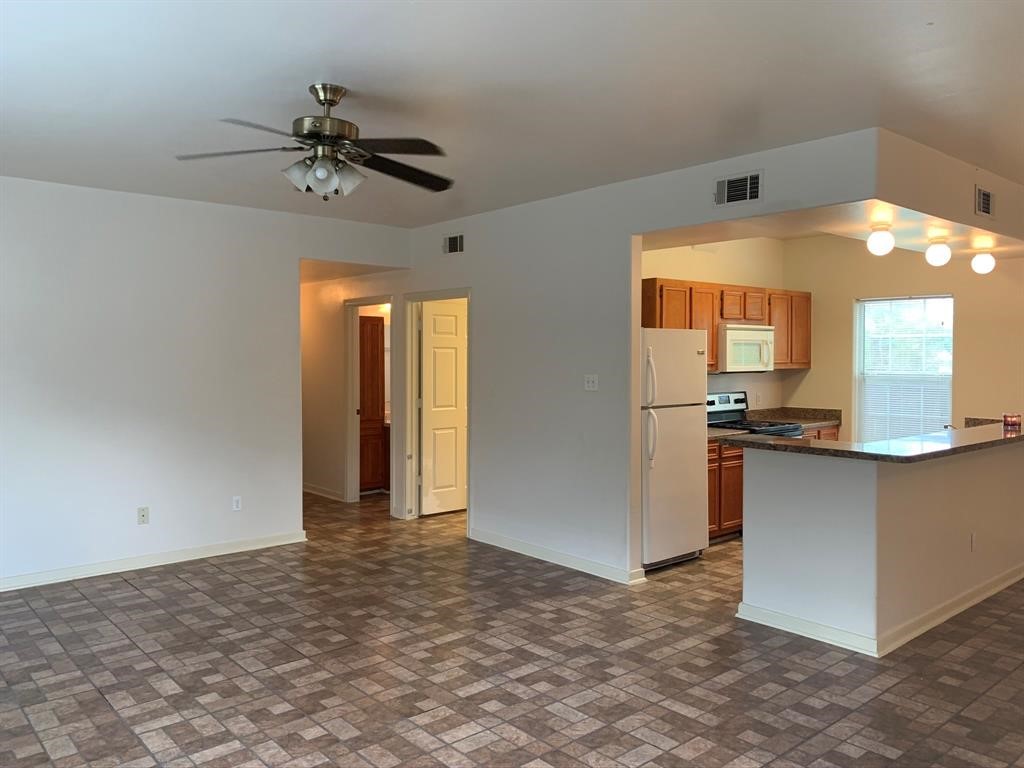 1513 Cage Street, Unit A Houston, TX 77020 - Photo 6 of 17 a view of a kitchen with a sink and cabinets