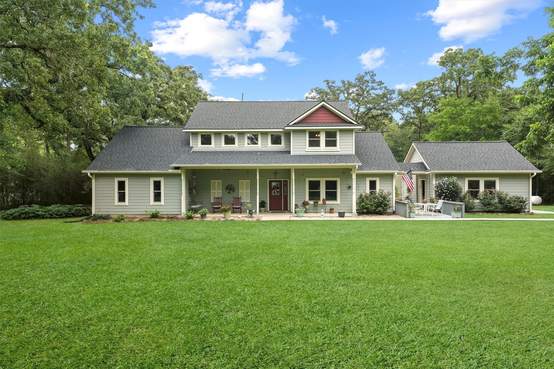6803 Treaschwig Road Spring, TX 77373 - Photo 2 of 22 a front view of a house with a garden