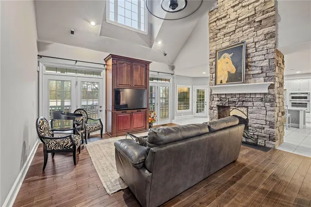 a kitchen with stainless steel appliances granite countertop a sink and cabinets