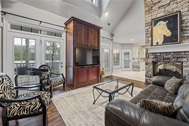 a bathroom with a toilet a sink and a mirror
