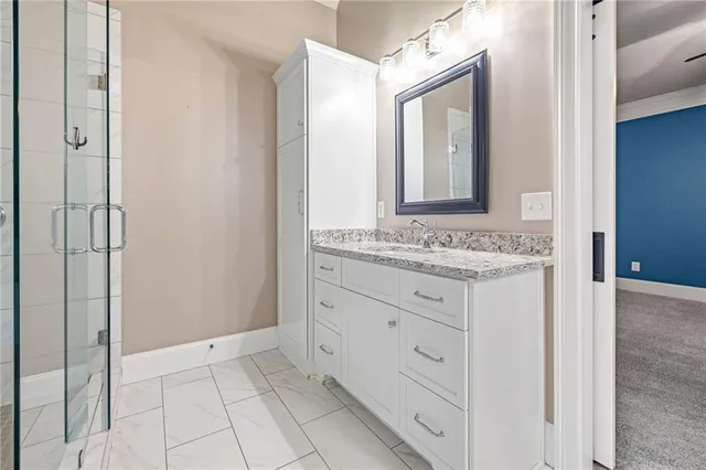 a view of a chairs and table in the balcony