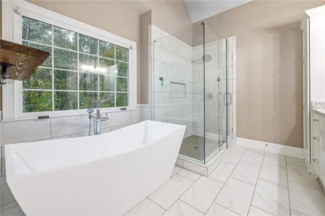 a view of a swimming pool with chairs