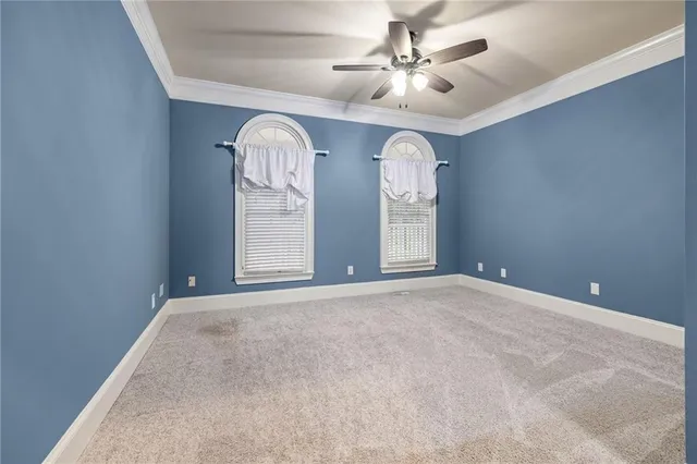 a view of a house with a snow in the yard
