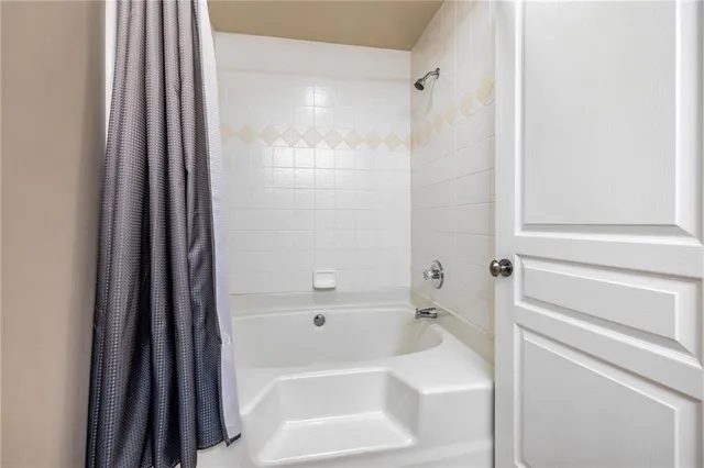 a view of a house with swimming pool and sitting area