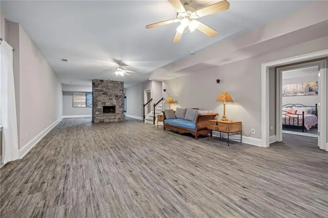 a view of a yard with large trees