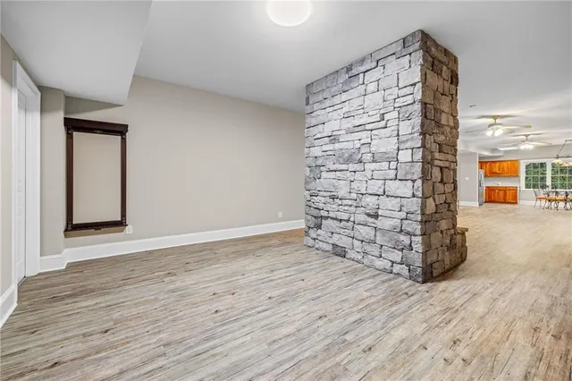 an aerial view of a house with swimming pool garden and patio