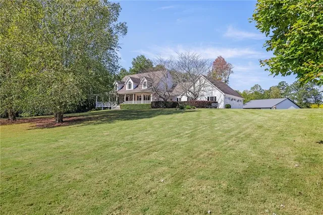 a kitchen with sink cabinets and a stove