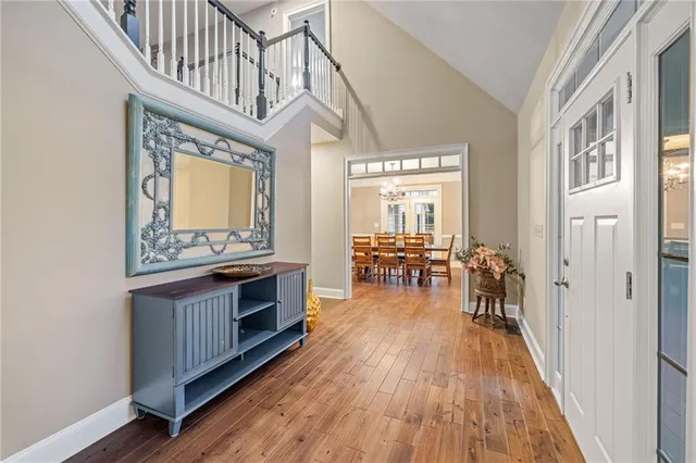 a kitchen with stainless steel appliances granite countertop a refrigerator and cabinets