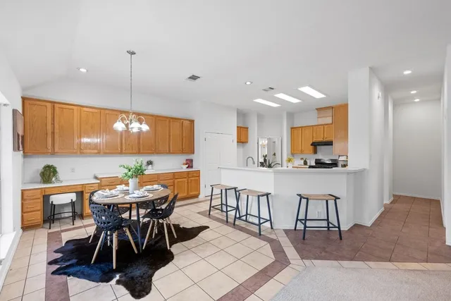 a view of a dining room with furniture