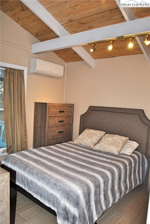 104 Pine Ridge Road Beech Mountain, NC 28604 - Photo 15 of 25 a bedroom with a bed and a dresser