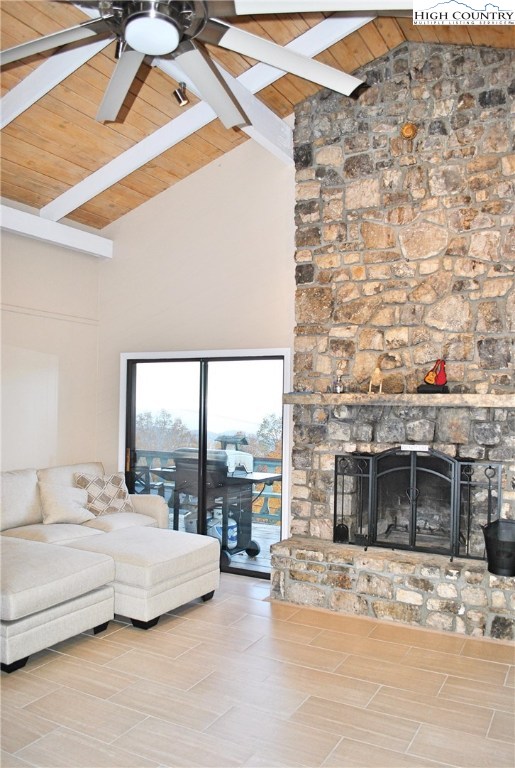 104 Pine Ridge Road Beech Mountain, NC 28604 - Photo 6 of 25 a bedroom with a bed and a fireplace with the outer view