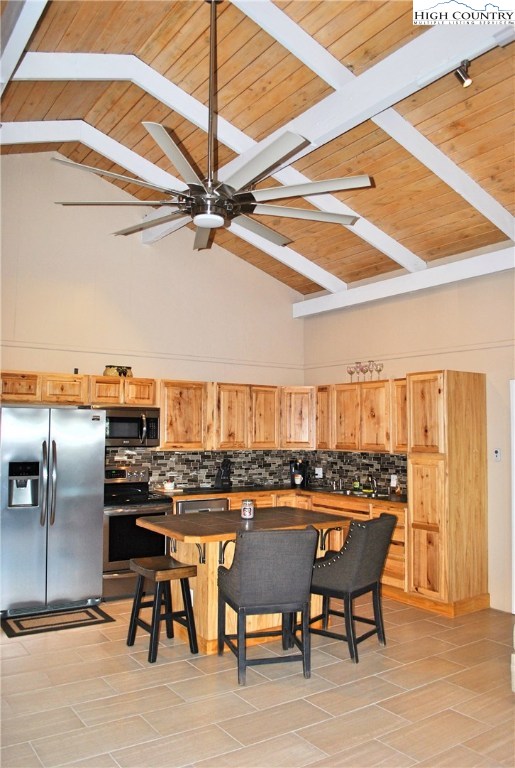 104 Pine Ridge Road Beech Mountain, NC 28604 - Photo 8 of 25 a view of a chairs and table in a patio
