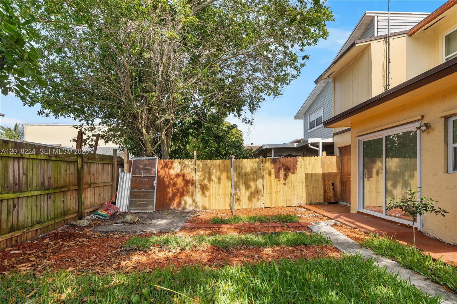 7958 Southwest 6th Street Pompano Beach, FL 33068 - Photo 47 of 57 a backyard of a house