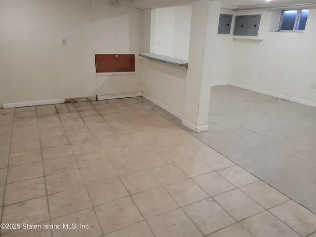 a bathroom with a shower and a toilet