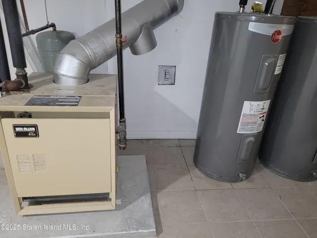 a bathroom with a toilet a sink and bathtub