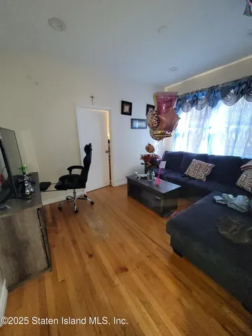 a living room with furniture and a couch